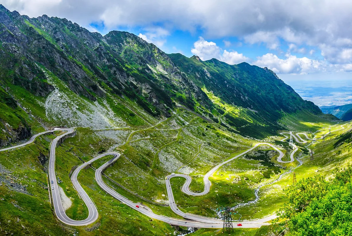 A winding road through an alpine landscape