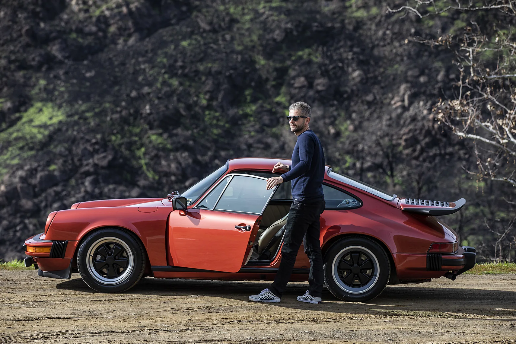 Founder with classic Porsche 911